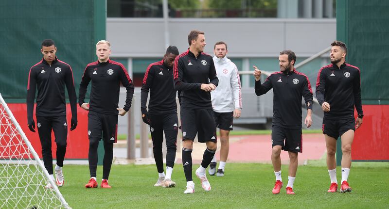 Mason Greenwood, Donny van de Beek, Nemanja Matic, Aaron Wan-Bissaka, Juan Mata and Alex Telles of Manchester United in action.