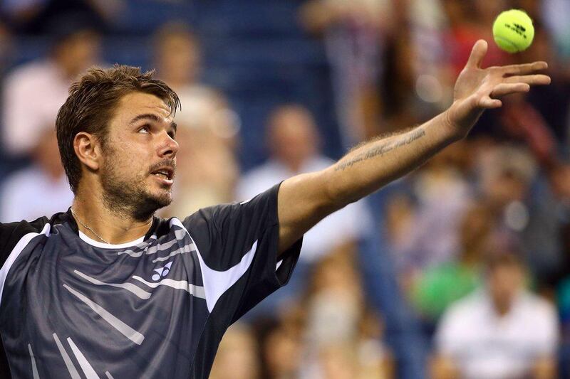 Stan Wawrinka prepares to serve against Thomaz Bellucci during his second round match at the US Open on Wednesday. Streeter Lecka / Getty Images / AFP / August 27, 2014  