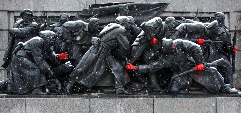 The hands of the soldiers on the Soviet Army Monument in Sofia, Bulgaria are painted red during a demonstration against the Russian invasion of Ukraine. Reuters