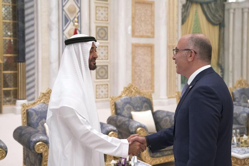 ABU DHABI, UNITED ARAB EMIRATES - May 20, 2018: HH Sheikh Mohamed bin Zayed Al Nahyan Crown Prince of Abu Dhabi Deputy Supreme Commander of the UAE Armed Forces (L), receives a foreign Ambassador, during an iftar reception at the Presidential Palace. 

( Hamad Al Kaabi / Crown Prince Court - Abu Dhabi )
---