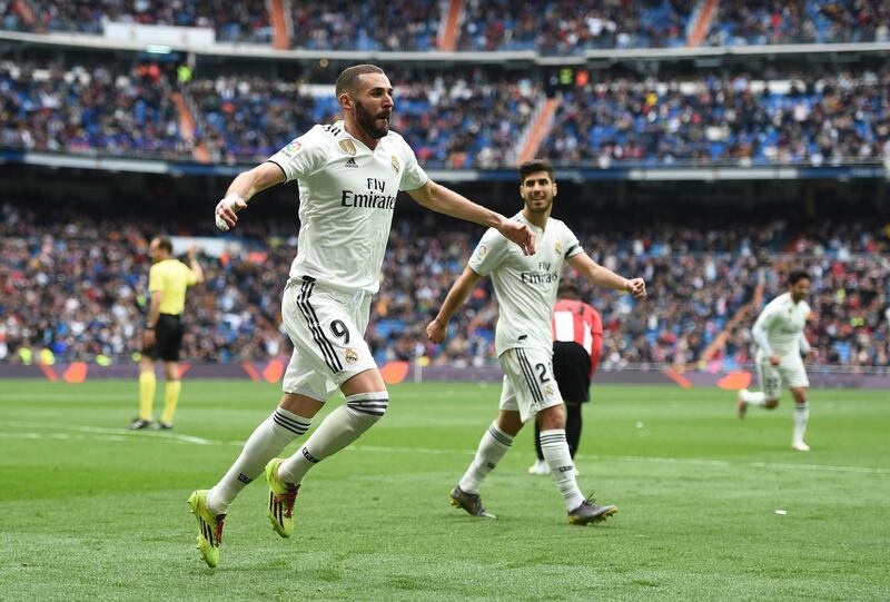 MADRID, SPAIN - APRIL 21: Karim Benzema of Real Madrid CF celebrates with Marco Asensio after scoring Real's second goal during the La Liga match between Real Madrid CF and Athletic Club at Estadio Santiago Bernabeu on April 21, 2019 in Madrid, Spain. (Photo by Denis Doyle/Getty Images)