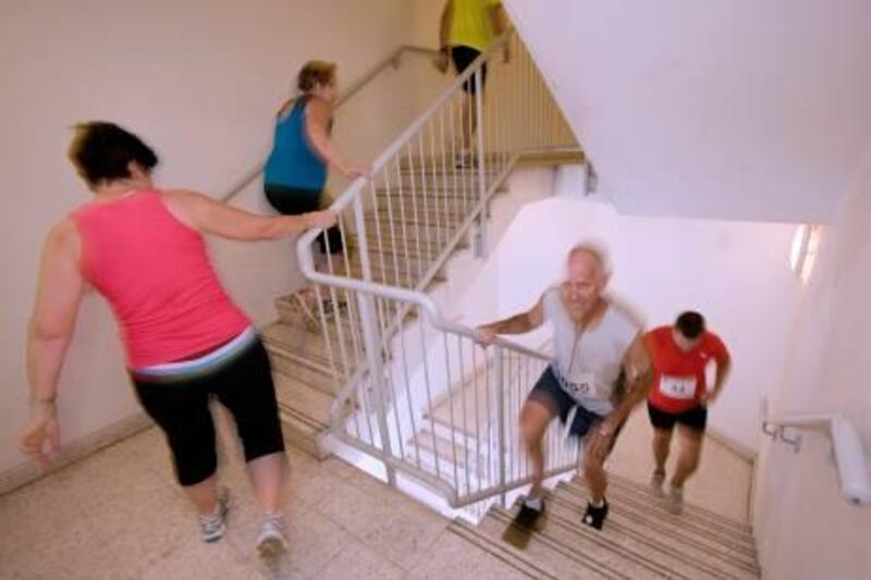 Runners race up the stair well to the 52nd floor of the Office Tower in the Vertical Marathon 2011 in aid of Medecins Sans Frontieres at Jumeriah Emirates Towers on Friday, April 29, 2011 in Dubai, United Arab Emirates. Photo: Charles Crowell for The National