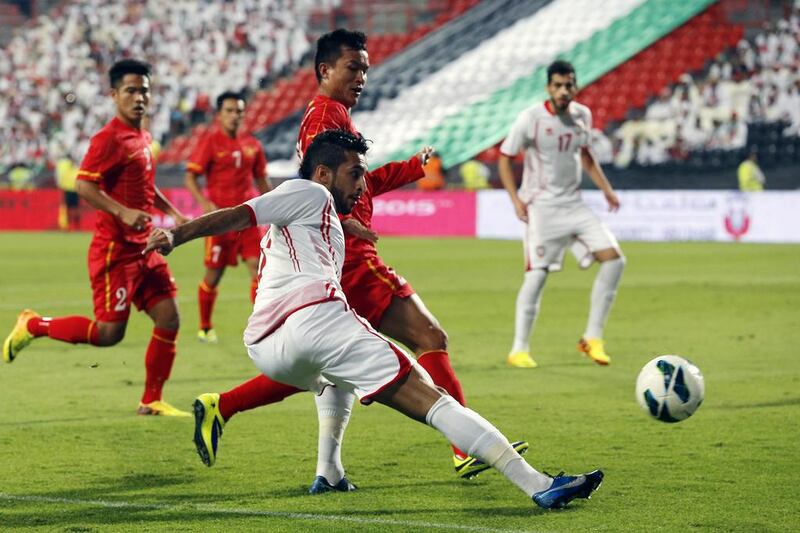 Ali Mabkhout, centre, made his presence known for the UAE in their 5-0 victory over  Vietnam during their 2015 Asian Cup qualifying match at Mohammed bin Zayed Stadium in Abu Dhabi. Mostafa Reda / Al Ittihad 