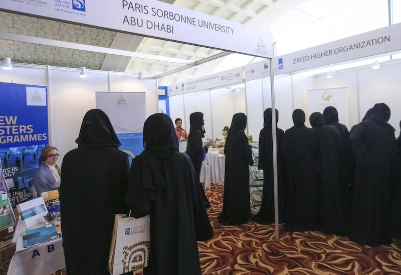 Emirati pupils visit the Paris Sorbonne University Abu Dhabi and Zayed Higher Organisation stands at the university fair in Al Ain. The first two days are for girls, with boys admitted on the third. Sarah Dea / The National