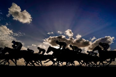 Runners and riders make their way down the straight as they compete in the MansionBet Handicap Hurdle at Huntingdon Racecourse. Picture date: Thursday February 25, 2021. PA Photo. See PA story RACING Huntingdon. Photo credit should read: Alan Crowhurst/PA Wire. RESTRICTIONS: Use subject to restrictions. Editorial use only, no commercial use without prior consent from rights holder.