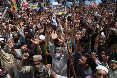 Supporters of Tehreek-e-Labbaik Pakistan (TLP) party shout slogans during a protest after their leader was detained following his calls for the expulsion of the French ambassador, in Lahore. AFP