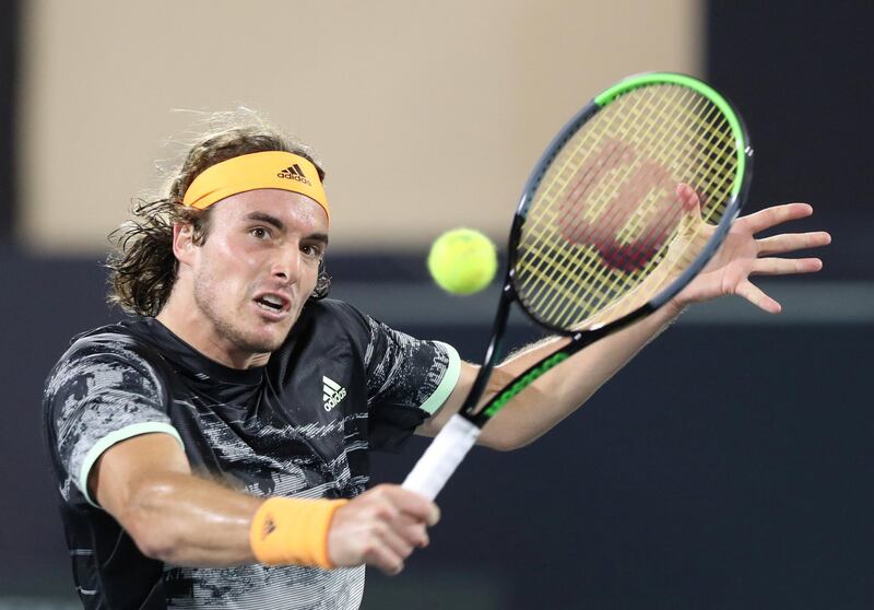 Abu Dhabi, United Arab Emirates - Reporter: Jon Turner: Stefanos Tsitsipas plays a shot during the semi final between Novak Djokovic v Stefanos Tsitsipas at the Mubadala World Tennis Championship. Friday, December 20th, 2019. Zayed Sports City, Abu Dhabi. Chris Whiteoak / The National