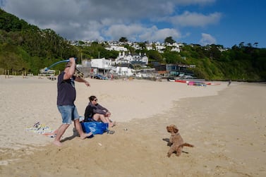 Holidaymakers on the beach in front of the Carbis Bay Hotel, Cornwall, the venue of the forthcoming G7 summit. Getty Images 