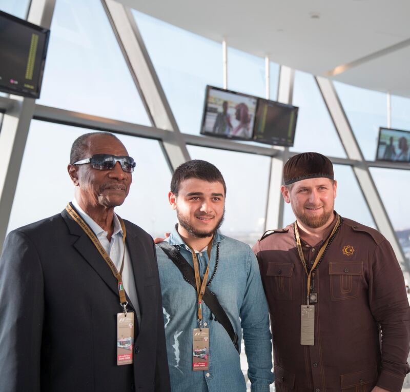 YAS ISLAND, ABU DHABI, UNITED ARAB EMIRATES - November 03, 2013: HE Alpha CondÃ© President of Guinea (L), and HE Ramzan Kadyrov President of Chechnya (R), attend the final race of the Formula 1 Etihad Airways Abu Dhabi Grand Prix at Yas Marina Circuit.
( Mohamed Al Hammadi / Crown Prince Court - Abu Dhabi )
--- *** Local Caption ***  20131103MH1567.JPG