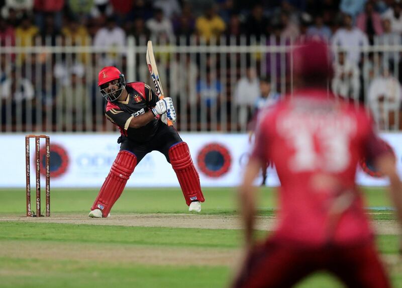 Sharjah, United Arab Emirates - November 21, 2018: Mohammad Shahzad of Rajputs scores 74 off 16 balls during the game between Sindhis and Rajputs in the T10 league. Wednesday the 21st of November 2018 at Sharjah cricket stadium, Sharjah. Chris Whiteoak / The National