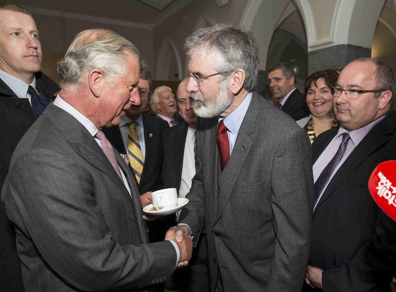 The historic handshake between Prince Charles and former Sinn Fein leader Gerry Adams, right, in Galway, Ireland, in 2015, the first time a leader of a political party with links to the Irish Republican Army had met a senior royal. Adam Gerrard / Reuters