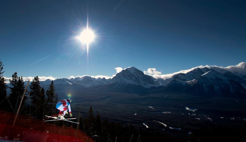 Beat Feuz, of Switzerland, soars down the course during the men's World Cup downhill ski race in Lake Louise, Alberta. AP