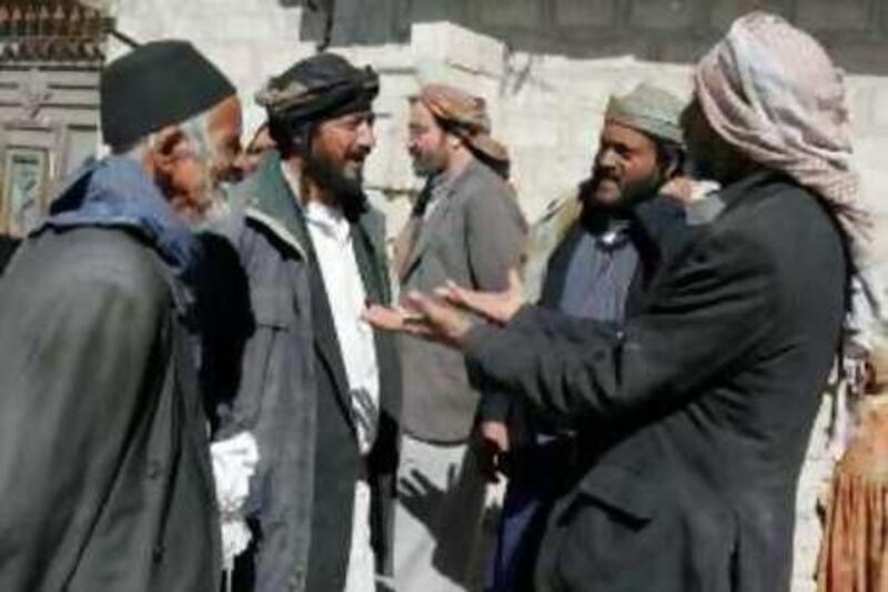 Unidentified Yemeni Jews and Muslims talk at the village of Kharef, 50 miles, 80 kilometers, north of the capital San'a, Yemen, Monday, Dec. 15, 2008. Muslim extremists in this northern Yemeni town are still harassing the small Jewish community after one of its members was gunned down last week, a local rabbi said on Sunday. (AP Photo/Mohammed al-Qadhi) *** Local Caption ***  CAI103_Mideast_Yemen_Jews.jpg