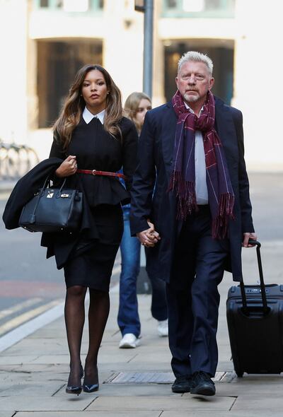 Becker arrives at Southwark Crown Court with his partner, Lilian de Carvalho Monteiro. Reuters