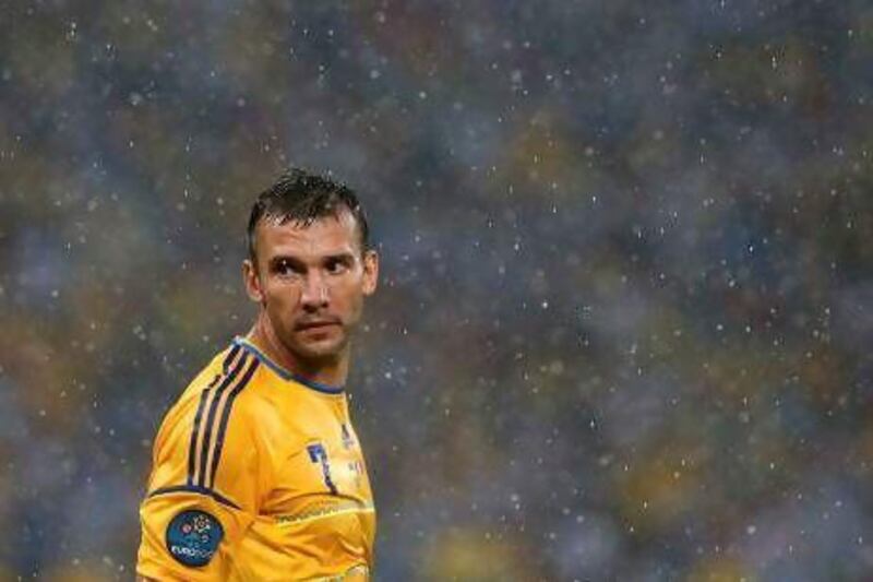 Ukraine's Andriy Shevchenko reacts as their Group D Euro 2012 soccer match against France was interrupted at Donbass Arena in Donetsk June 15, 2012. REUTERS/Alessandro Bianchi (UKRAINE - Tags: SPORT SOCCER) *** Local Caption *** STN110_SOCCER-EURO-_0615_11.JPG