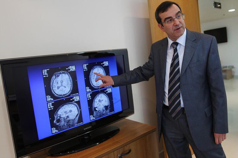 United Arab Emirates- Dubai - February 18, 2010:

NATIONAL: Neurosurgeon, Dr. Haluk Deda, shows MRI results of stem cell treatments he performed on a stroke patient from his office at the Halman Neurotherapy Center in Dubai on Thursday, February 18, 2010. Amy Leang/The National