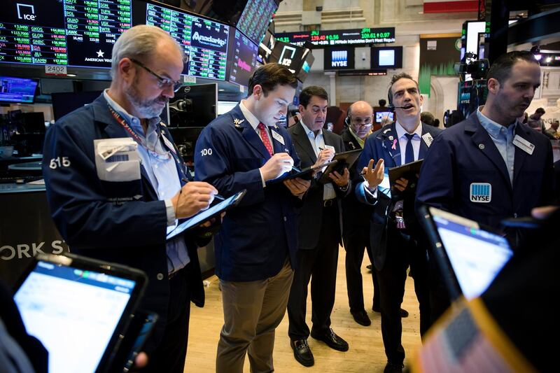 Traders work on the floor of the New York Stock Exchange (NYSE) in New York, U.S., on Friday, May 24, 2019. U.S. equities climbed at the end of a bruising week in which escalating trade tensions dominated markets. Photographer: Michael Nagle/Bloomberg