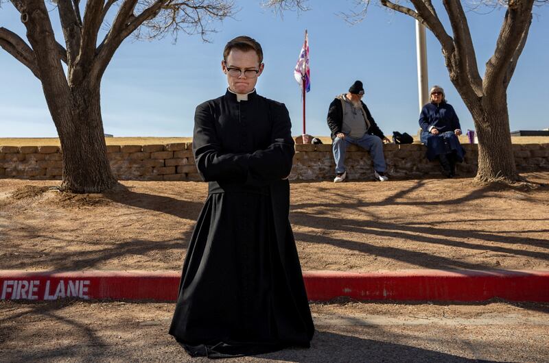 A priest protests against abortion outside a clinic in New Mexico where the practice is illegal. Reuters