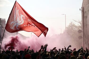 Soccer Football - Champions League - Semi Final - First Leg - Liverpool v Villarreal - Anfield, Liverpool, Britain - April 27, 2022 Liverpool fans with flares outside the stadium before the match REUTERS / Phil Noble