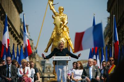 France's far-right National Front leader Marine Le Pen delivers a speech during the party's annual celebration of Joan of Arc. Getty Images