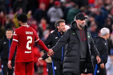 LIVERPOOL, ENGLAND - APRIL 11: Jurgen Klopp, Manager of Liverpool, shakes hands with Joe Gomez of Liverpool at full-time following the team's defeat in the UEFA Europa League 2023/24 Quarter-Final first leg match between Liverpool FC and Atalanta at Anfield on April 11, 2024 in Liverpool, England. (Photo by Stu Forster / Getty Images)