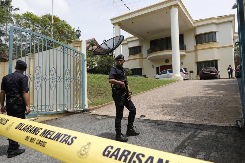 Police put a cordon in front of the North Korean embassy in Kuala Lumpur, Malaysia, on Tuesday, March 7, 2017. Malaysia said North Korean embassy staff were barred from leaving its country. Malaysia expelled the North Korean ambassador on Monday. Vincent Thian / AP Photo