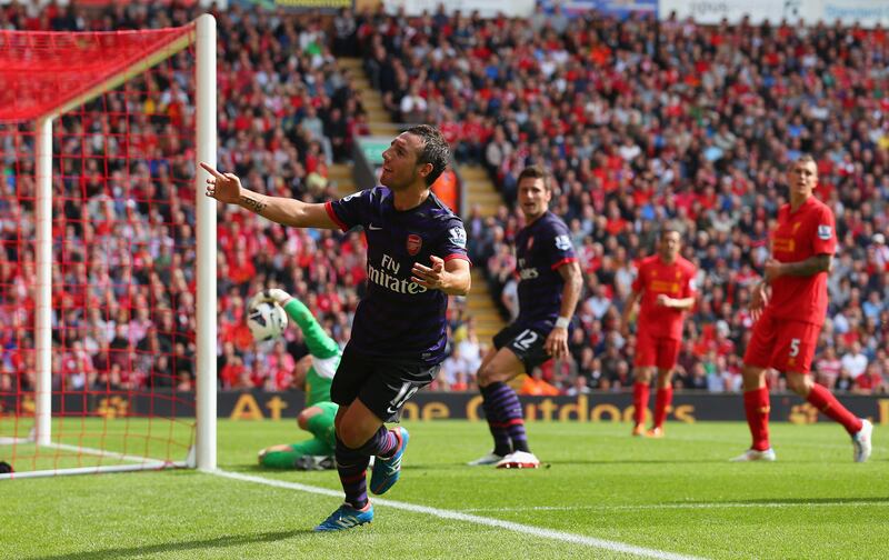 LIVERPOOL, ENGLAND - SEPTEMBER 02:  Santi Cazorla of Arsenal celebrates after scoring the second goal during the Barclays Premier League match between Liverpool and  Arsenal at Anfield on September 2, 2012 in Liverpool, England.  (Photo by Alex Livesey/Getty Images) *** Local Caption ***  151144914.jpg