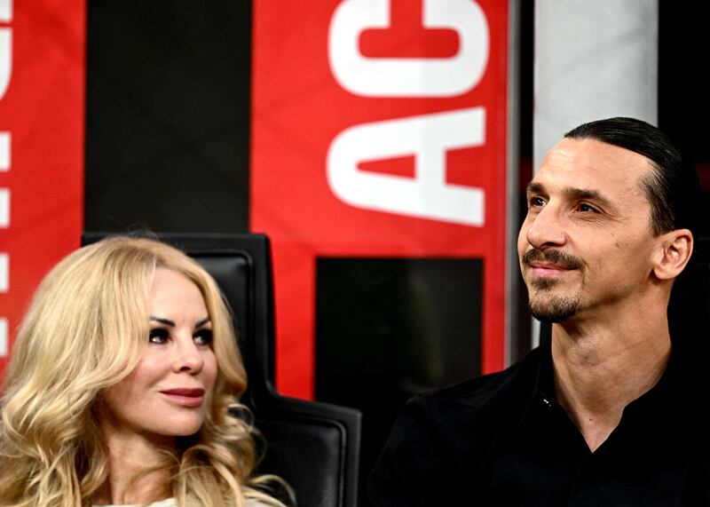 AC Milan's Swedish forward Zlatan Ibrahimovic and his wife Helena Seger attend the match against Hellas Verona. AFP
