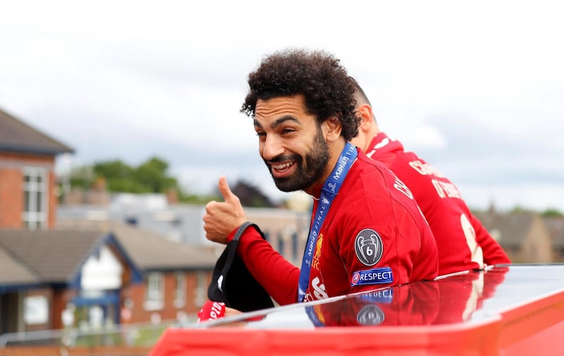 Soccer Football - Champions League - Liverpool victory parade - Liverpool, Britain - June 2, 2019  Liverpool's Mohamed Salah during the victory parade  REUTERS/Phil Noble