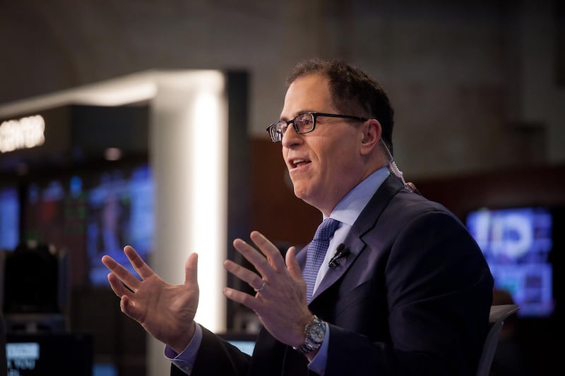 Michael Dell, chief executive officer of Dell Technologies Inc., speaks during an interview on the floor of the New York Stock Exchange (NYSE) in New York, U.S., on Monday, July 2, 2018. U.S. stocks fell on lower than normal volume as investors waved off stronger than expected manufacturing numbers and focused on fears of increasing global trade tensions. Photographer: Michael Nagle/Bloomberg