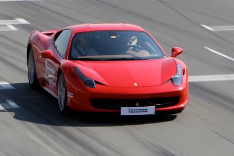 DUBAI, UNITED ARAB EMIRATES Ð Nov 22: Media personals having a test ride in the performance cars during the Michelin tyre testing event held at Dubai Autodrome in Dubai. (Pawan Singh / The National) For Motoring. Story by Richard Whitehead