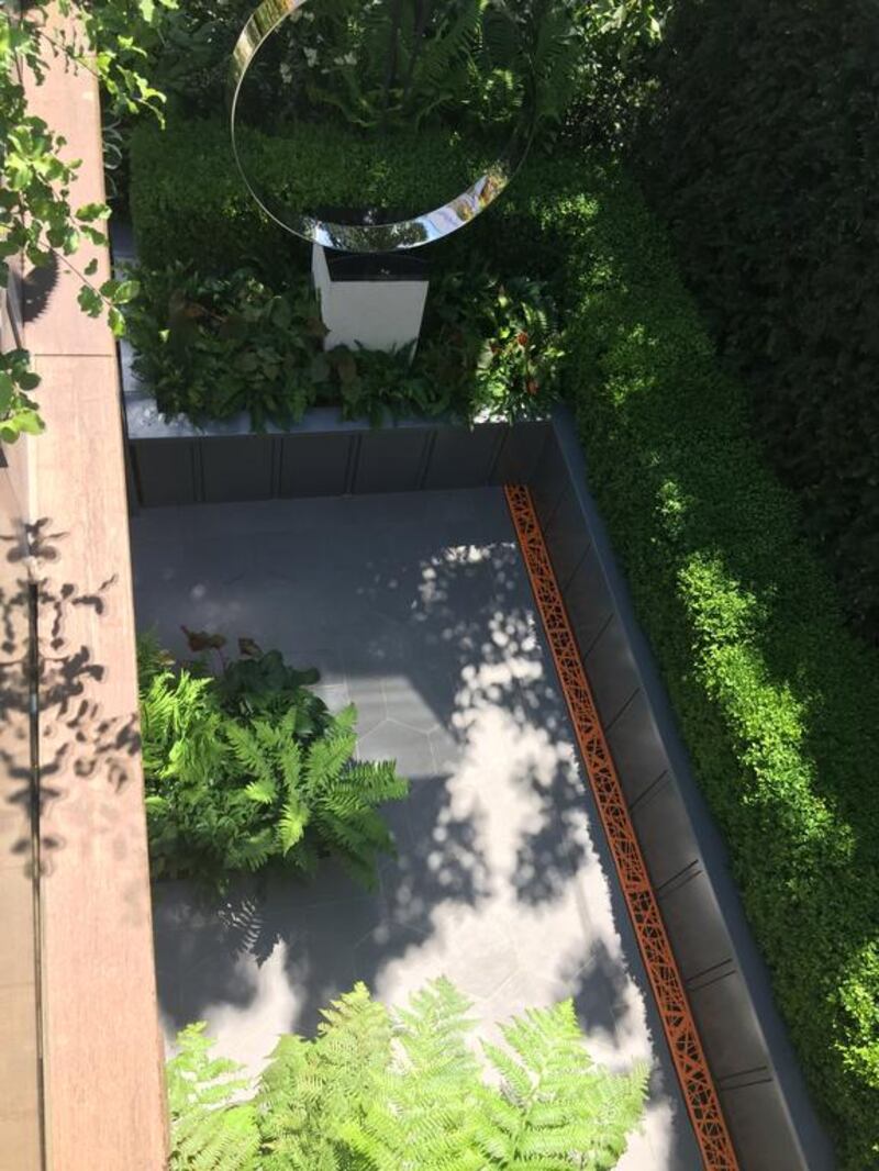 Kate Gould - City Living view down to shaded entrance area. Courtesy RHS Chelsea Flower Show)