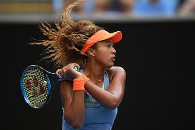 epa06456174 Naomi Osaka of Japan in action against Ashleigh Barty of Australia during round three on day six of the Australian Open tennis tournament, in Melbourne, Victoria, Australia, 20 January 2018.  EPA/LUKAS COCH  AUSTRALIA AND NEW ZEALAND OUT