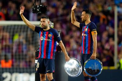 Jordi Alba, left, and Sergio Busquets at a farewell ceremony after their last home match with Barcelona, in May. The pair will be joining Lionel Messi at Inter Miami. EPA