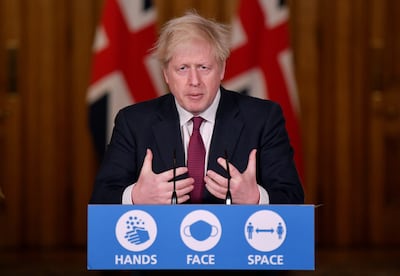 Boris Johnson speaks during a news conference inside 10 Downing Street on December 19, 2020. Getty Images