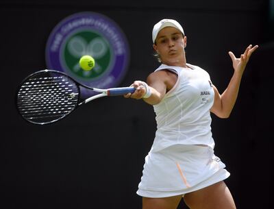epa07689511 Ashleigh Barty of Australia returns to Saisai Zheng of China in their first round match during the Wimbledon Championships at the All England Lawn Tennis Club, in London, Britain, 02 July 2019. EPA/FACUNDO ARRIZABALAGA EDITORIAL USE ONLY/NO COMMERCIAL SALES