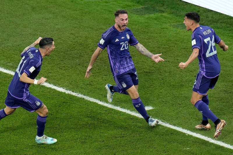 Alexis Mac Allister 8 - Scored his first international goal to put Argentina ahead, a low strike into the corner. Worked hard, lots of running. Fine season for his club with Brighton and now for his country. AP Photo