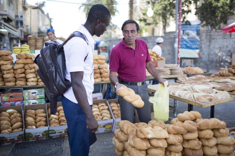 Ka’id Razem selling bread  in east Jerusalem at Damascus gate.