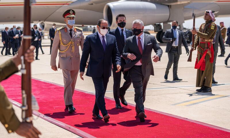 Jordanian King Abdullah II welcoming Egyptian President Abdel Fattah El Sisi ahead of the summit in the capital Amman. AFP