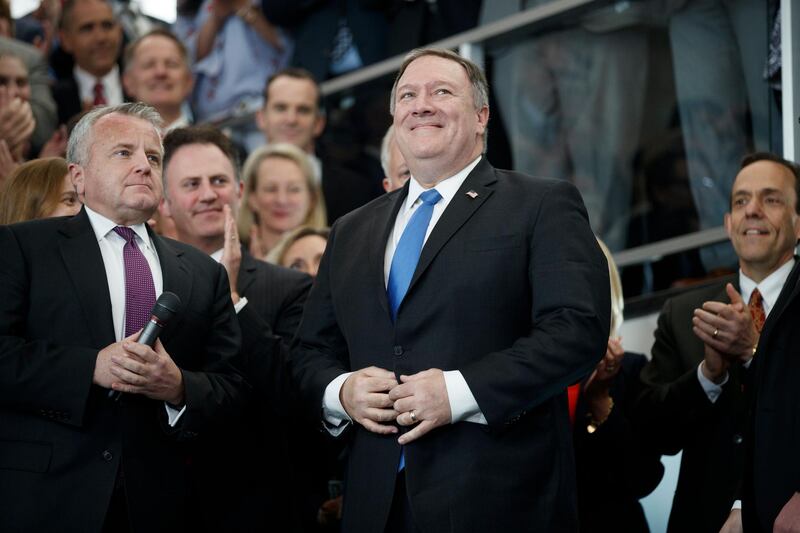 epa06705091 US Secretary of State Mike Pompeo (R), with former acting Secretary of State John Sullivan (L) arrives and delivers remarks for his first day of work at the State Department in Washington, DC, USA, 01 May 2018. Secretary Pompeo succeeds Rex Tillerson as the 70th US Secretary of State.  EPA/SHAWN THEW