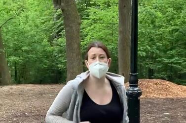 Amy Cooper with her dog talking to Christian Cooper in Central Park in New York. Amy Cooper, walking her dog who called the police during a videotaped dispute with Christian Cooper, a Black man, was charged Monday, July 6, 2020, with filing a false report. AP