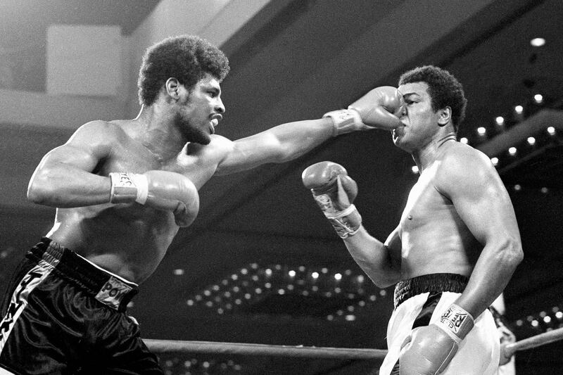 Leon Spinks punches heavyweight champion Muhammad Ali in the face during their title fight at Las Vegas on February 15, 1978. AP