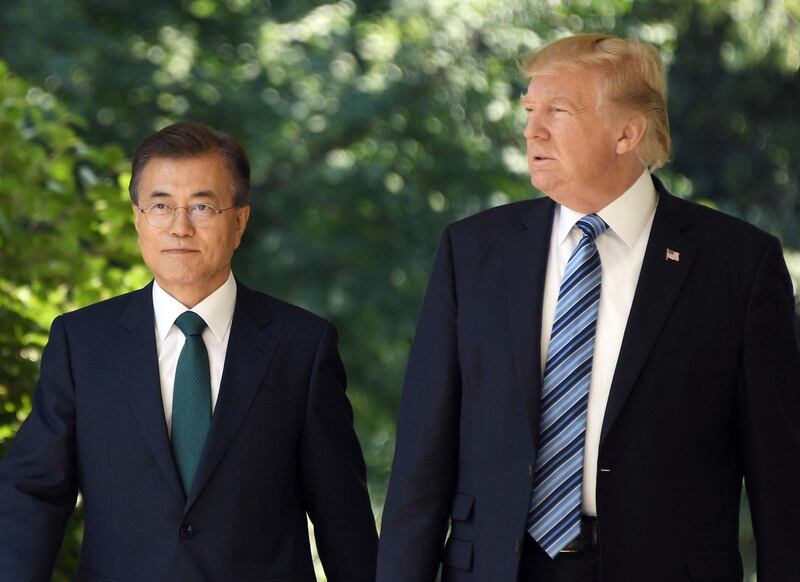 (FILES) In this file photo taken on June 30, 2017, South Korean President Moon Jae-in (L) and US President Donald Trump arrive to give a joint press conference in the Rose Garden at the White House in Washington, DC.
US President Donald Trump said "things are going very well" after talking with South Korea's President Moon Jae-in on April 28, 2018, about an upcoming summit with North Korean leader Kim Jong Un. / AFP PHOTO / JIM WATSON