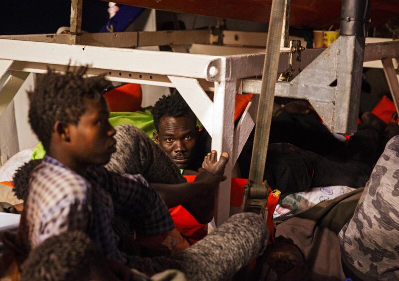 epa06838214 A handout photo made available by German NGO 'Mission Lifeline' on 25 June 2018 shows migrants aboard the NGO's rescue vessel 'Lifeline' in the Mediterranean, 25 June 2018. Members of the German parliament Bundestag on 25 June reported from their visit to the ship saying they witnessed a 'catastrophic' situation. Both Italy and Malta deny the ship an entry to one of their country's ports.  EPA/Felix Weiss / HANDOUT  HANDOUT EDITORIAL USE ONLY/NO SALES
