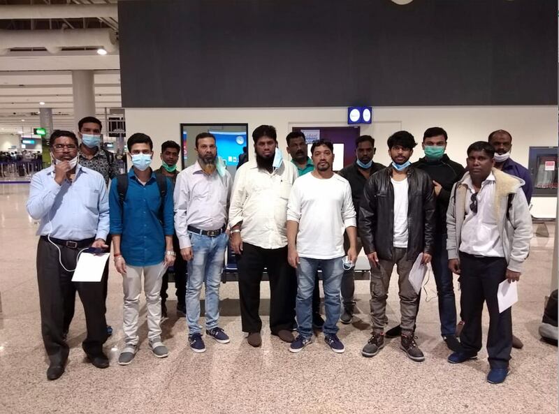 Fourteen Indian sailors held in Yemen for 10 months were repatriated through Dubai on Sunday. Courtesy: Pravasi Legal Cell