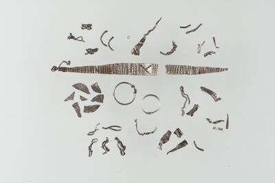 A haul of Viking silver treasure, including fragments of Arabic coins, discovered in Norway.