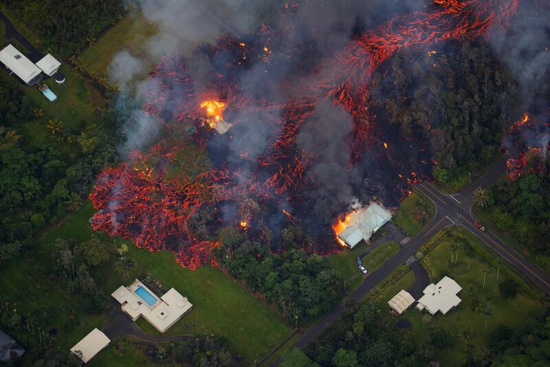Activity continues on Kilauea's east rift zone, as a robust fissure eruption in Leilani Estates sends a massive flow into the subdivision, consuming all in its path, near Pahoa, Hawaii. Bruce Omori / Paradise Helicopters / EPA