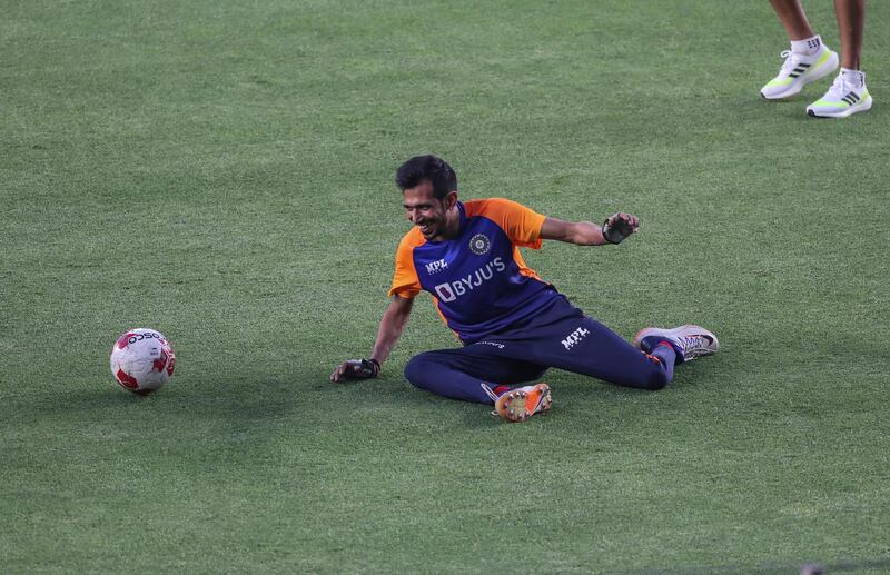 India's Yuzvendra Chahal takes a fall. PA