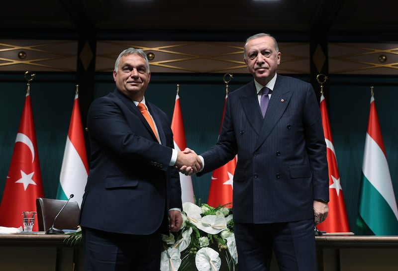 Turkey's President Recep Tayyip Erdogan, right, shakes hands with Hungary's Prime Minister Viktor Orban during a meeting in Ankara in 2021. AP