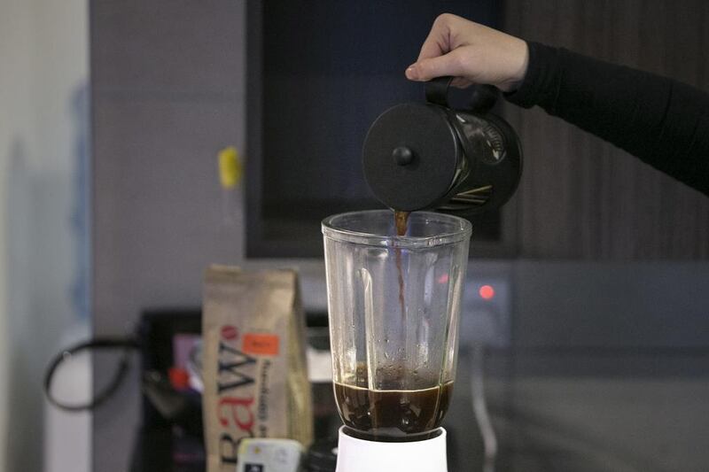 Step 5: Pour the hot, steeped coffee into a glass blender. Plastic blenders are not good for this drink as the coffee is very hot. Silvia Razgova / The National